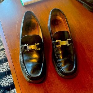 Size 12 black Ferragamo loafers.